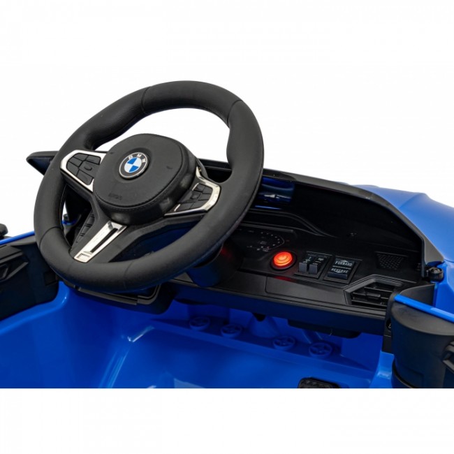 Masinuta electrica cu telecomanda BMW M4, roti EVA, scaun tapitat, 112x71x46 cm, putere 70W - Albastru