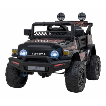Masinuta electrica cu telecomanda TOYOTA FJ CRUISER 4 X 4, roti EVA, scaun tapitat, 100x64x71 cm, putere 90W - Negru Masinuta electrica cu telecomanda TOYOTA FJ CRUISER 4 X 4, roti EVA, scaun tapitat, 100x64x71 cm, putere 90W - Negru